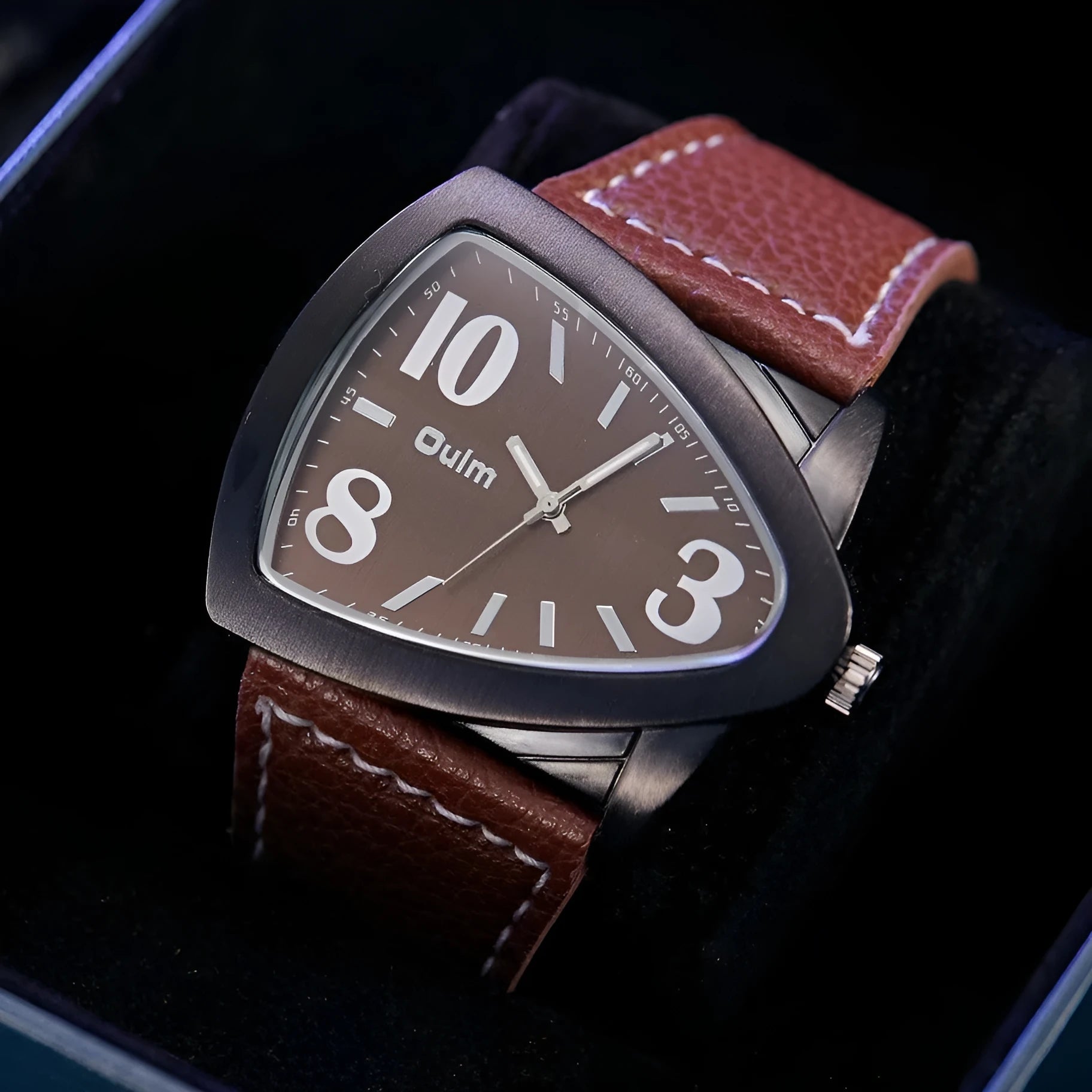 Men's brown casual quartz watch with a triangle belt on a wrist, showing slim 9mm profile.