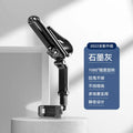 Black and green dual clip car phone bracket mounted on dashboard holding mobile phone