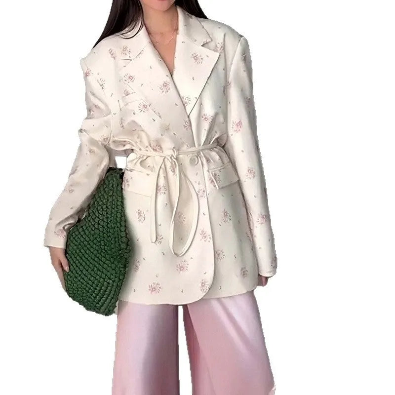 Collar lace-up waist-tight suit jacket in polyester fabric with long sleeves, showing cinched silhouette