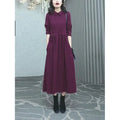Purplish red women's plus size dress with extra long sleeves and urban style design