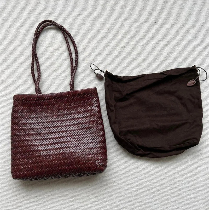 Brown woven leather tote bag with three-dimensional outer pocket and genuine cowhide construction