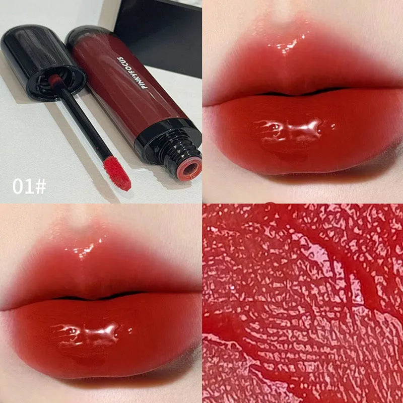 Black shiny Mirror Lip Lacquer tube with six swatches showing matte shades from tomato to sweet potato.