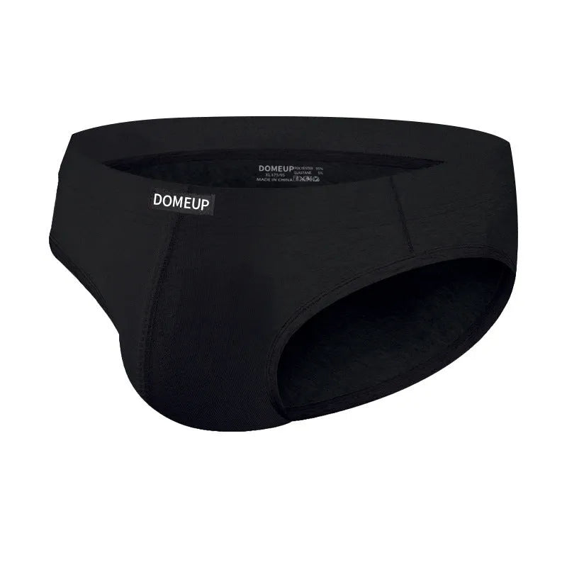 Solid colour men's seamless low waist briefs in black on a white background