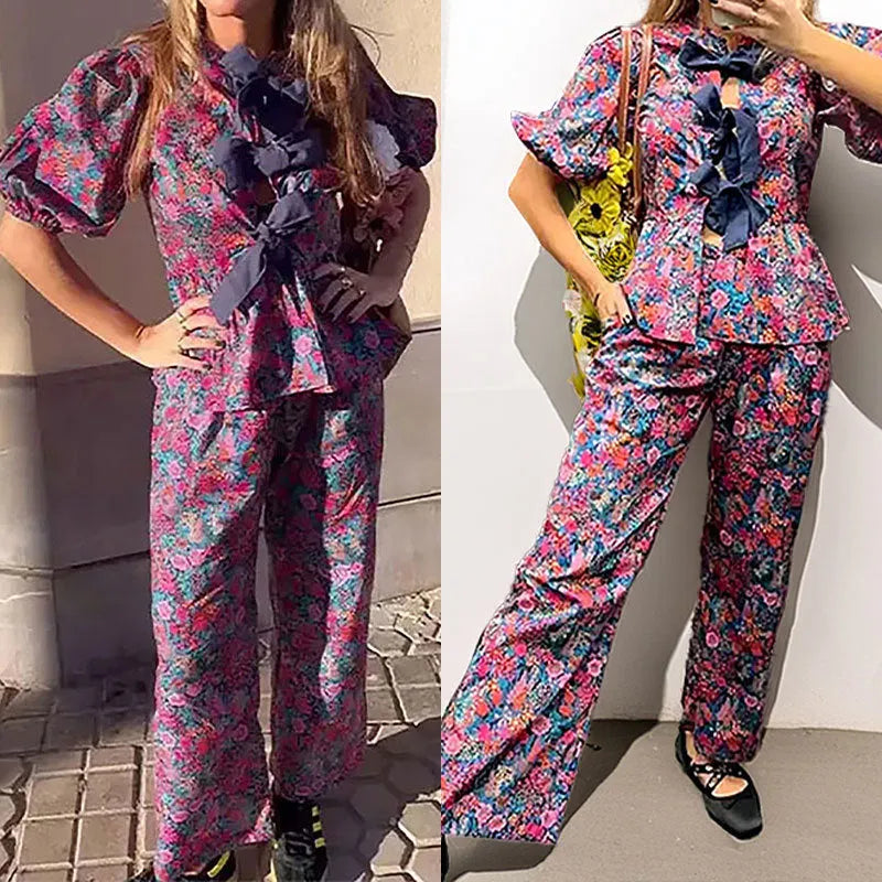 Women's floral print trousers suit set with tie-neck top and puff sleeves