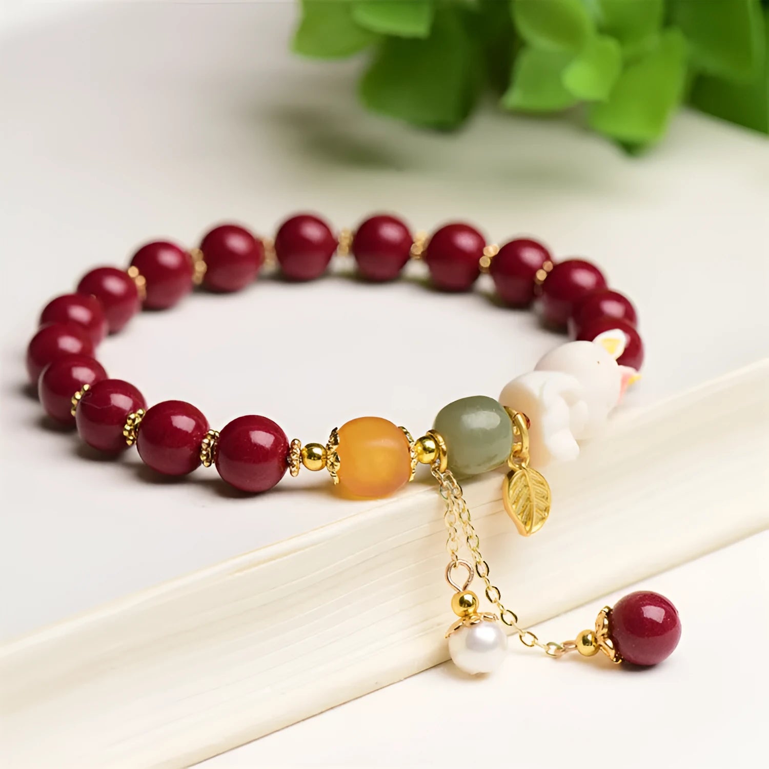 Women's natural beeswax and purple gold sand bracelet with cinnabar rabbit charm