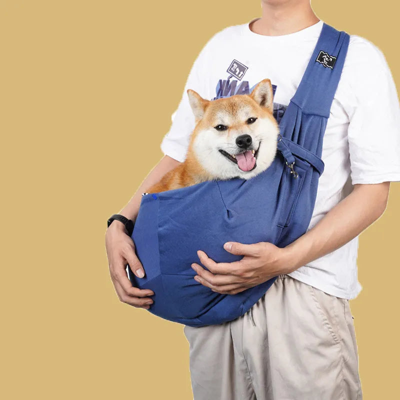 Breathable folding cat messenger bag in blue with mesh panels and adjustable shoulder strap