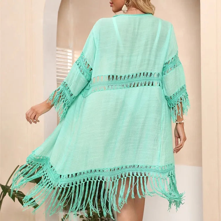 Women's hand-crocheted acrylic beach cover-up cardigan with tassel detailing in yellow colour