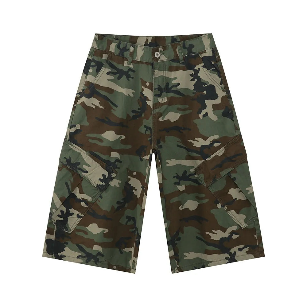 Men's loose-fit camouflage cotton trousers with wide legs, cropped hem, side stitching, and large front pockets.