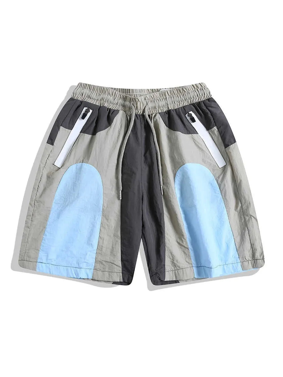 Blue patchwork quick-drying men's beach shorts with loose straight-leg fit for outdoor sports