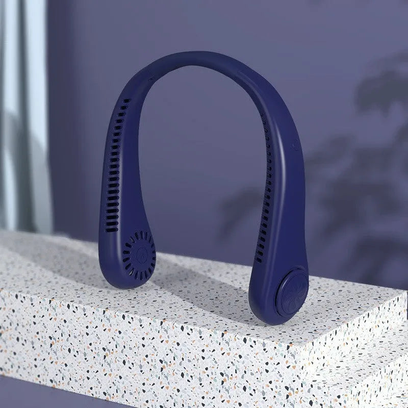 Pink portable bladeless neck fan being worn, showing flexible neckband and air outlets.