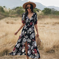 Yellow floral print women's dress with V-neck, short sleeves, elastic high waist, and flowing mid-length skirt.