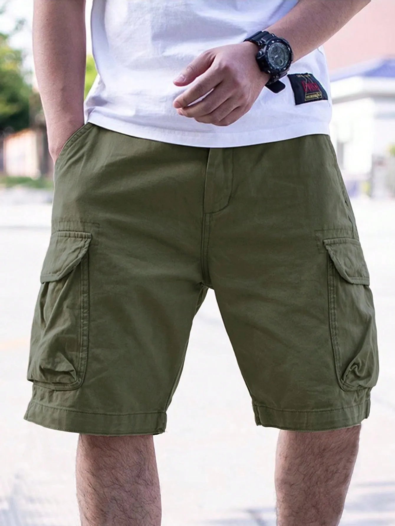 Men's loose fit cotton blend shorts in Army Green colour on a white background