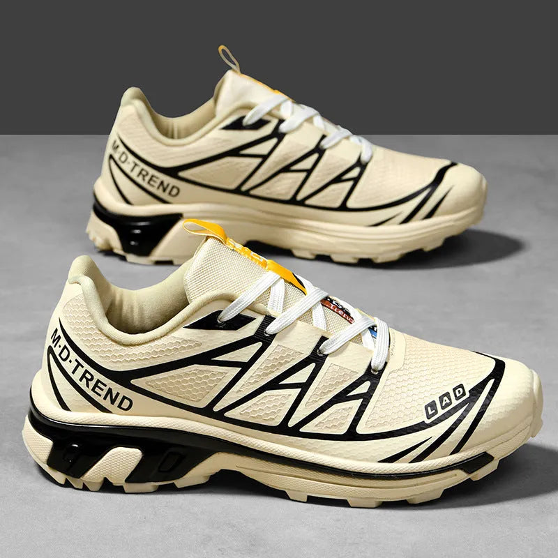 Men's and women's low-top hiking shoes in khaki colour with round toe and lace-up front.
