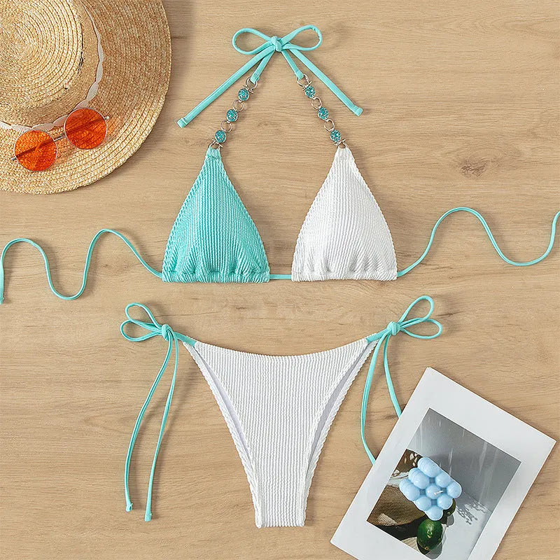 Women's colour matching swimsuit with lace-up front and pearl chain trim