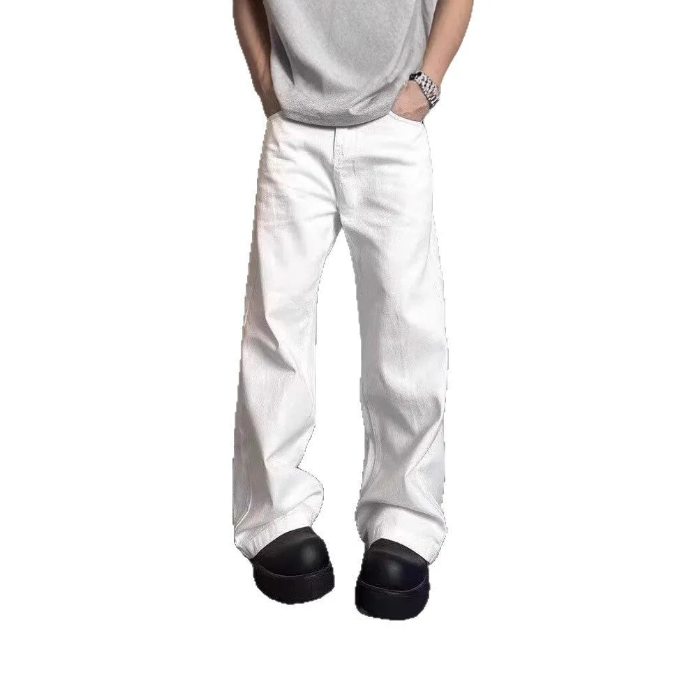 Men's white straight-leg cotton denim jeans on a plain background.