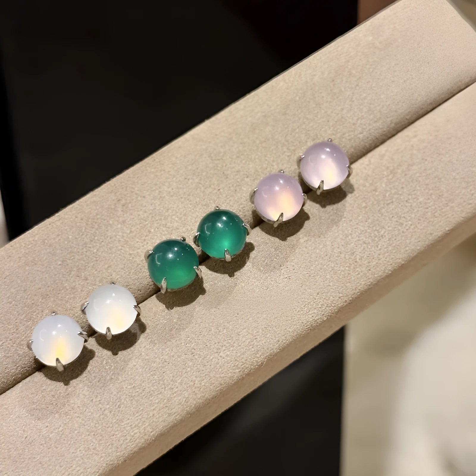 Round egg surface chalcedony stud earrings with four-claw setting in emerald green, pink purple and milk white