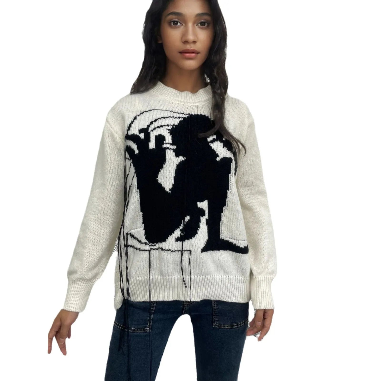 Women's loose alpaca wool sweater with abstract pattern and tassel detailing in street fashion style