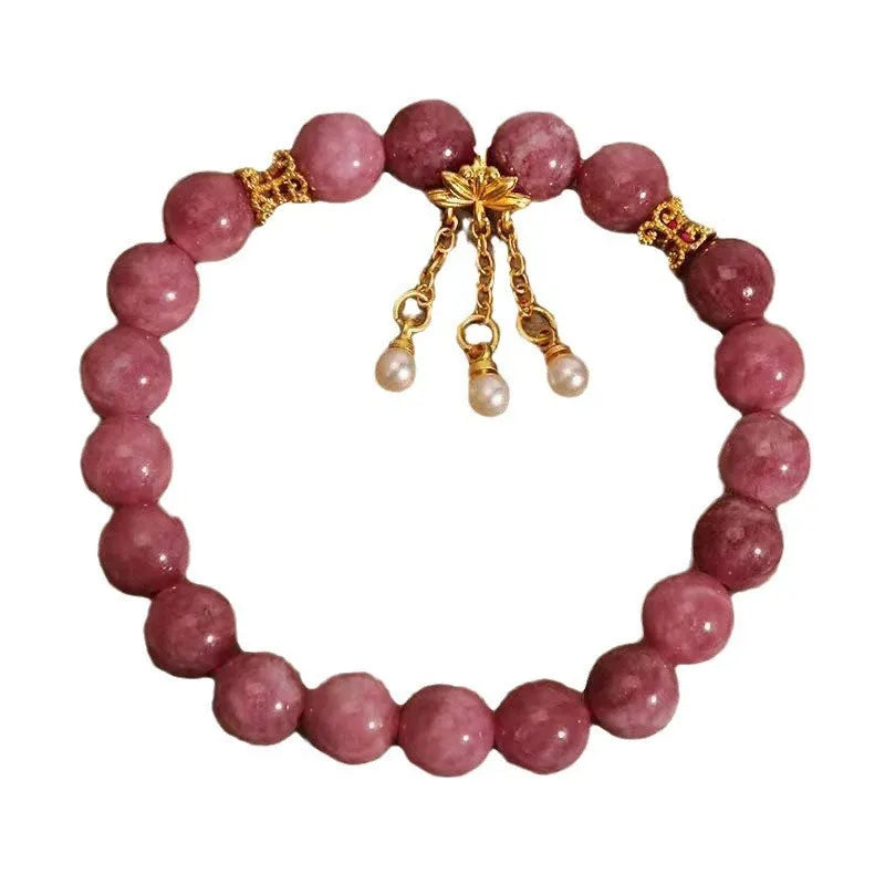 Pink lotus tassel bracelet with natural stone beads and crystal accents
