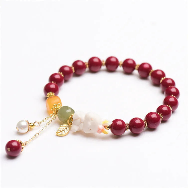 Women's natural beeswax and purple gold sand bracelet with cinnabar rabbit charm