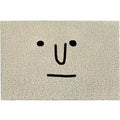 Square PVC floor mat with cartoon facial expression and geometric pattern in Mr. Big Nose colour.