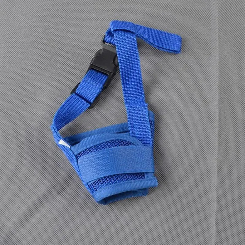Adjustable plastic dog muzzle in black, shown on a size chart with measurements.