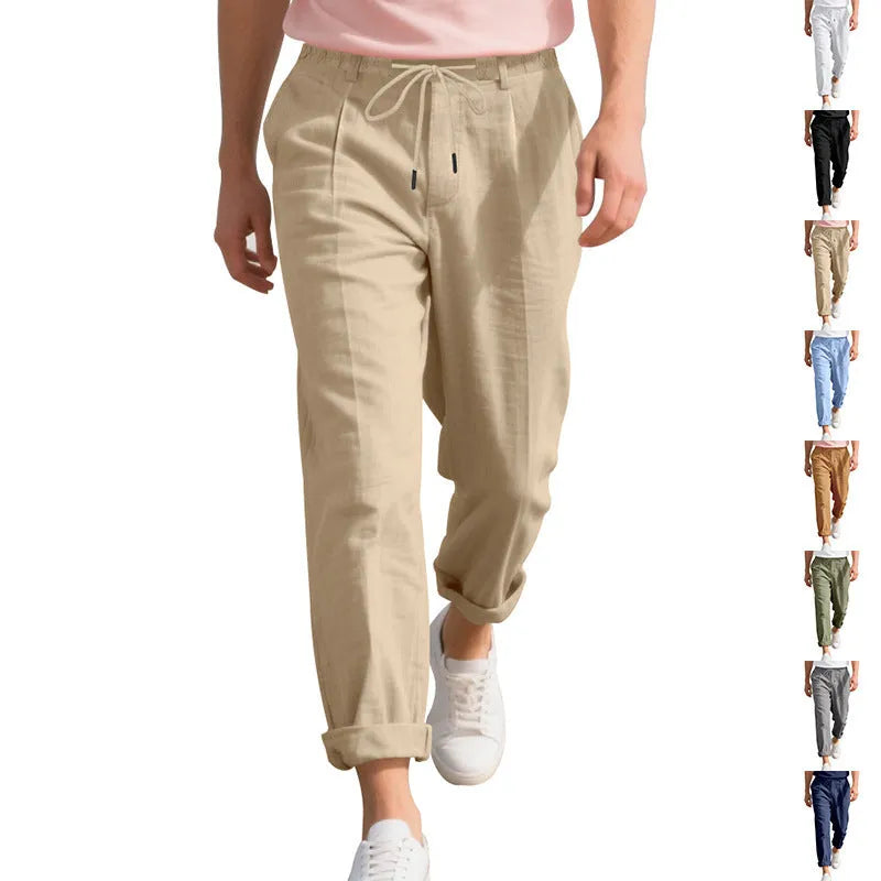 Men's casual linen trousers in a straight leg cut with a drawstring waist, shown in a light colour.