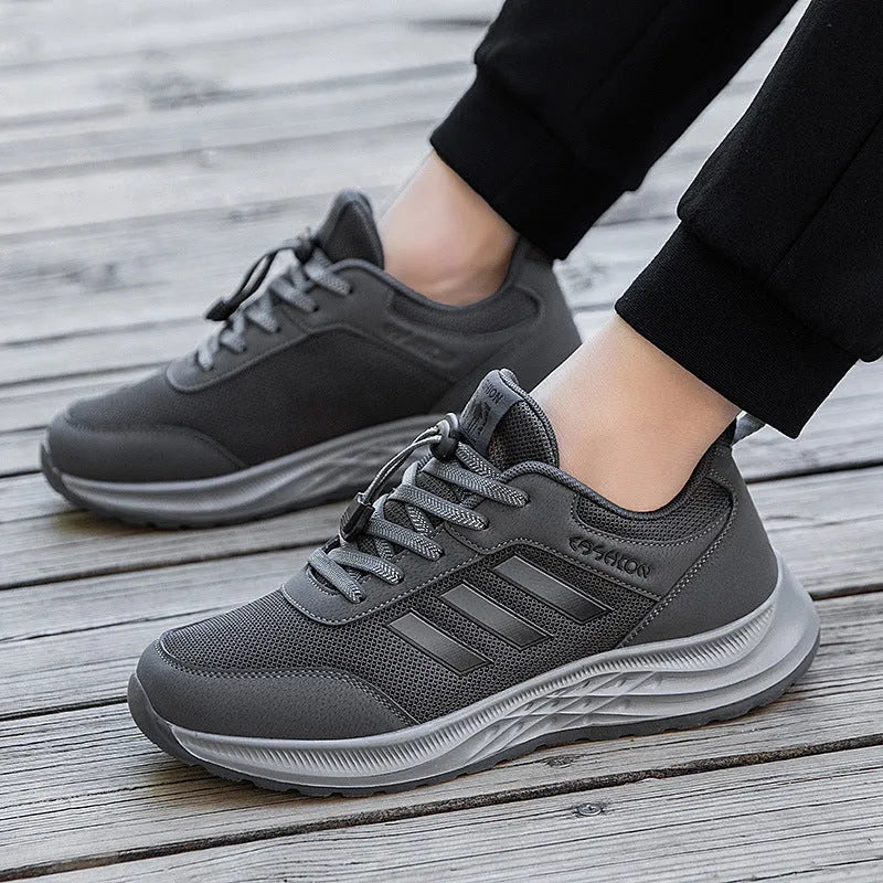Breathable mesh elastic slip-on casual shoes for men and women in purple, black, and grey.