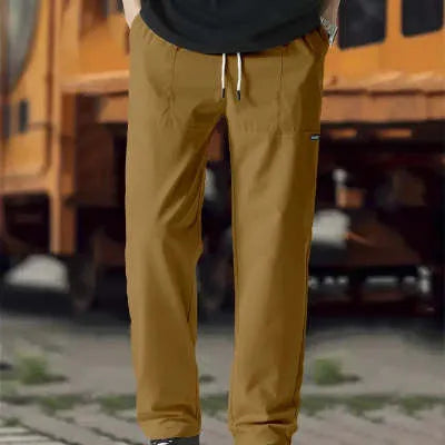 Men's polyester trousers in light grey, shown flat, with a size label indicating S-XXXL range.