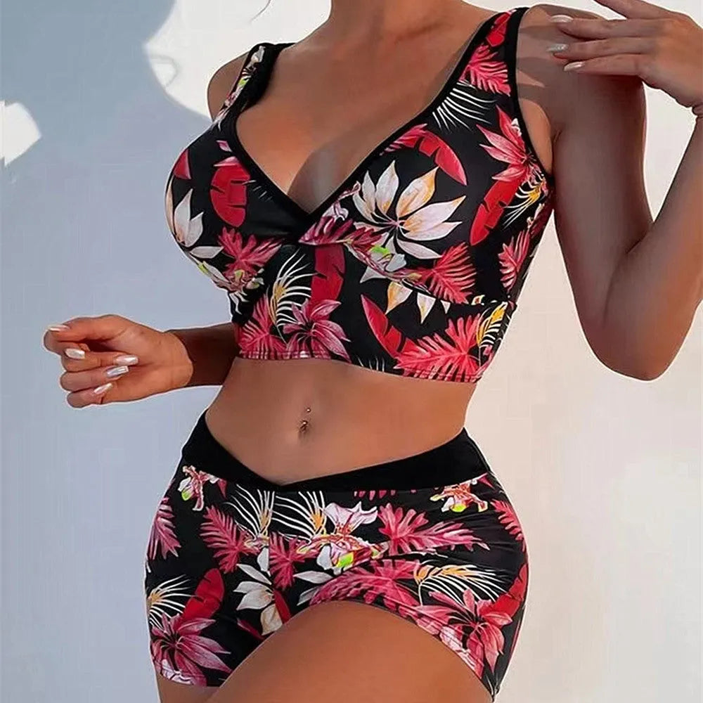 Women's two-piece swimsuit with printed boxer shorts in multicolour pattern
