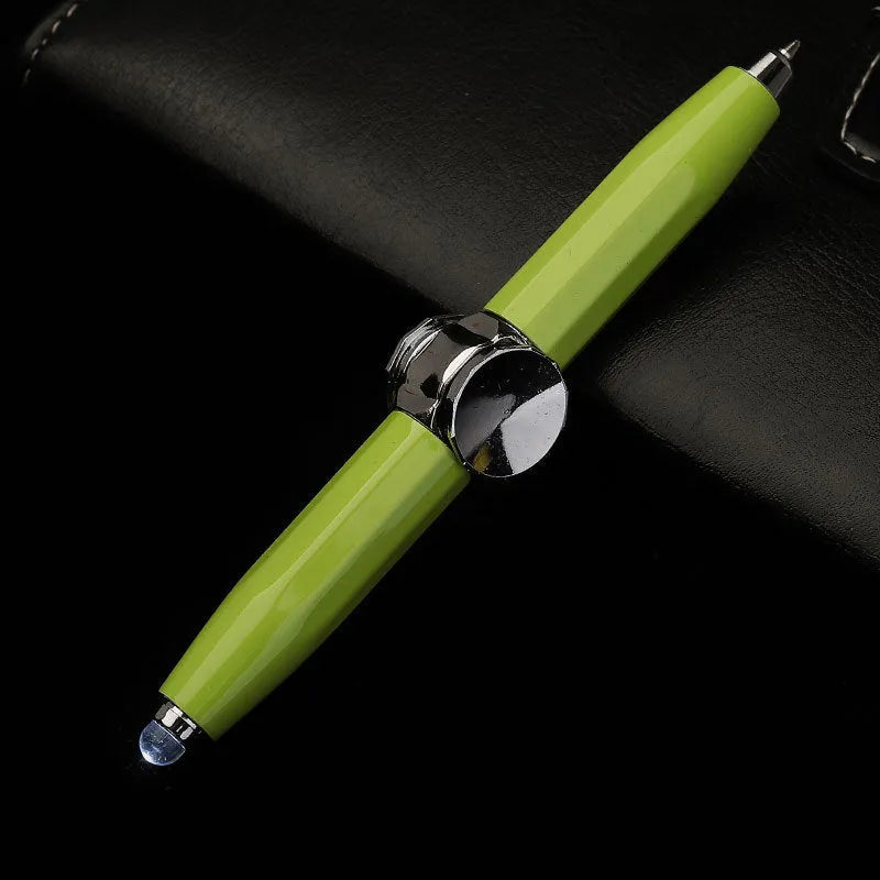Metal ballpoint pen with integrated LED gyro spinner showing colour-changing lights during spinning