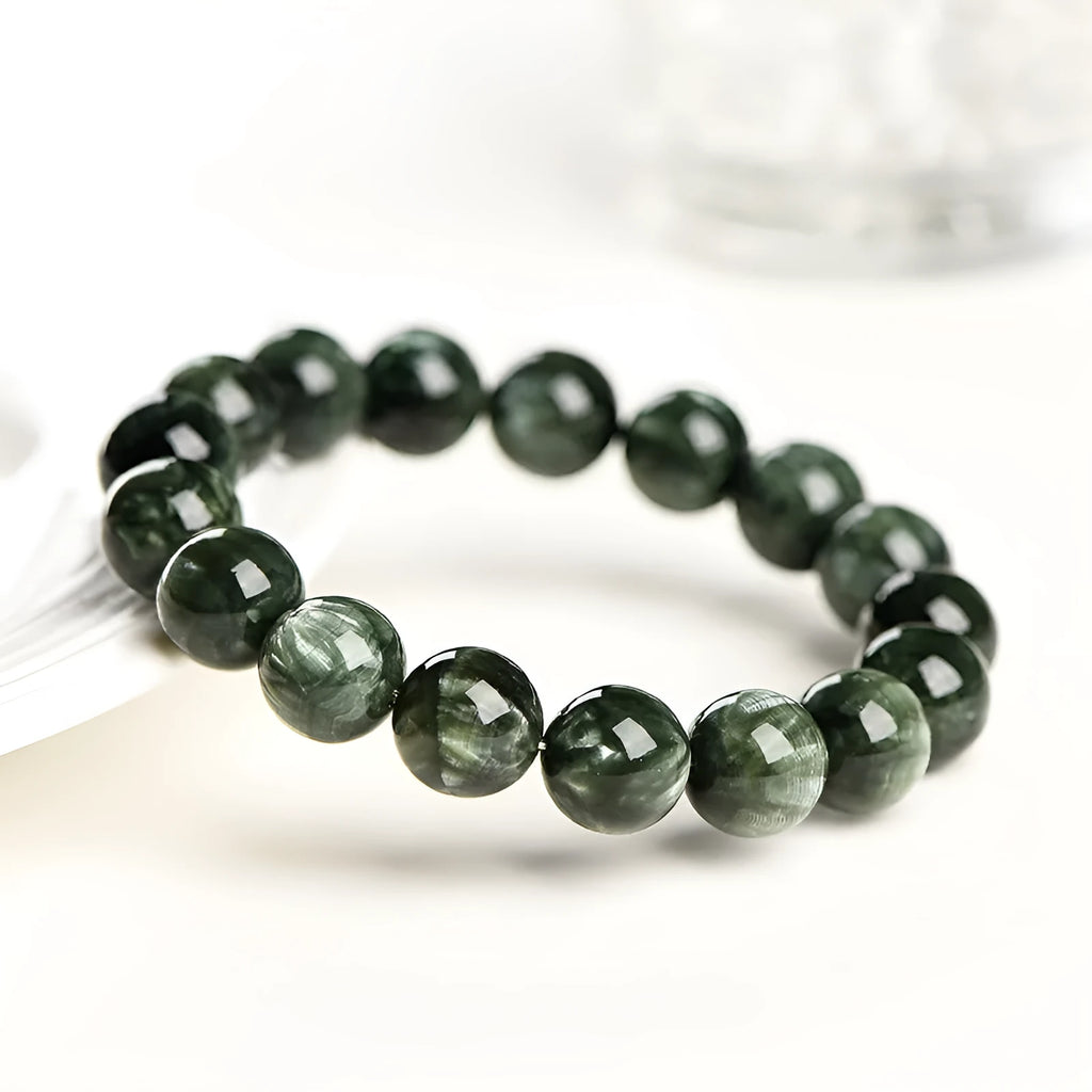 Green dragon crystal bracelet with 8-9mm round beads and ruyi charm on wrist