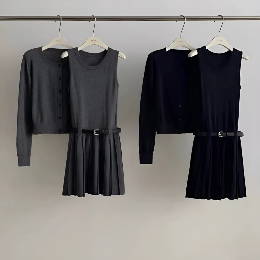 Women's art retro knitted two-piece set featuring a pleated vest skirt with 3D pattern and a long-sleeved cardigan.