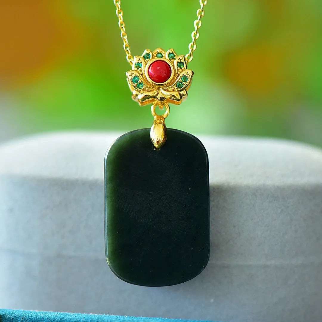 Modern natural Hetian grey jade pendant with copper inlay and ink-blue jade accents on a necklace chain.