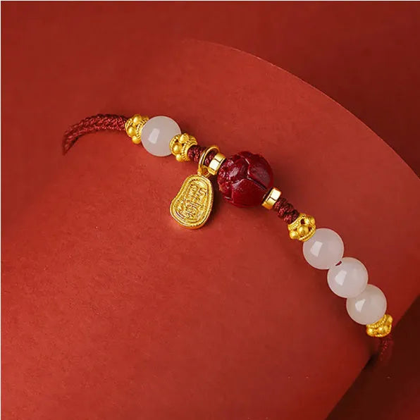 Women's adjustable bracelet with Hetian jade, cinnabar and red rope on 925 silver chain