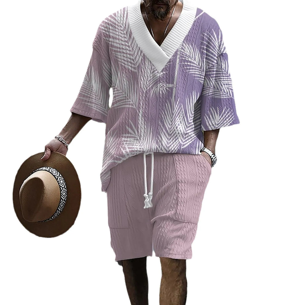 Men's grey printed knitted shorts suit with drop-shoulder short-sleeved top on a hanger.