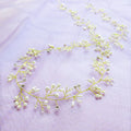 Crystal and pearl wedding hair band for brides in gold, silver, rose gold colours