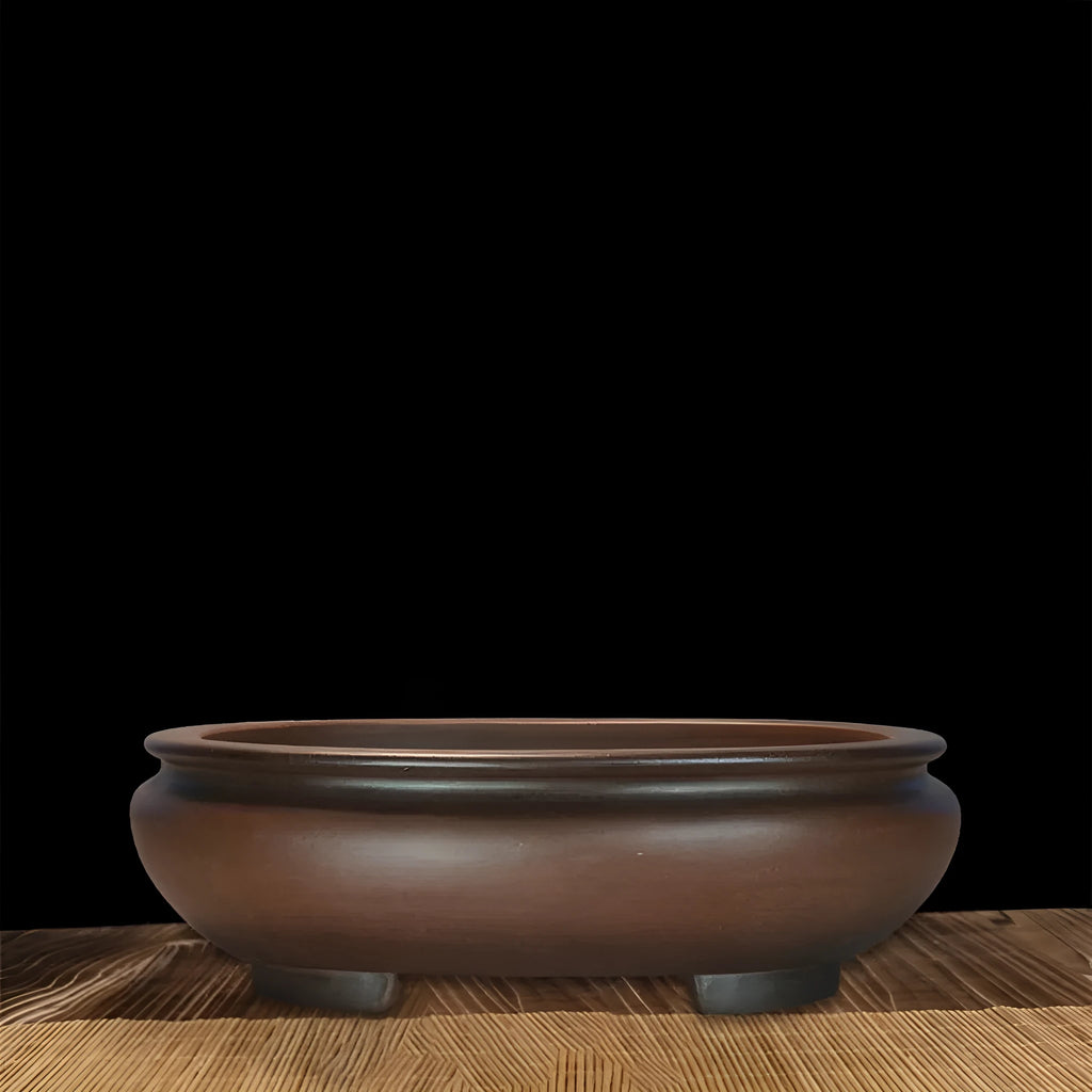 Handmade purple clay classical style flowerpot for indoor desktop use.