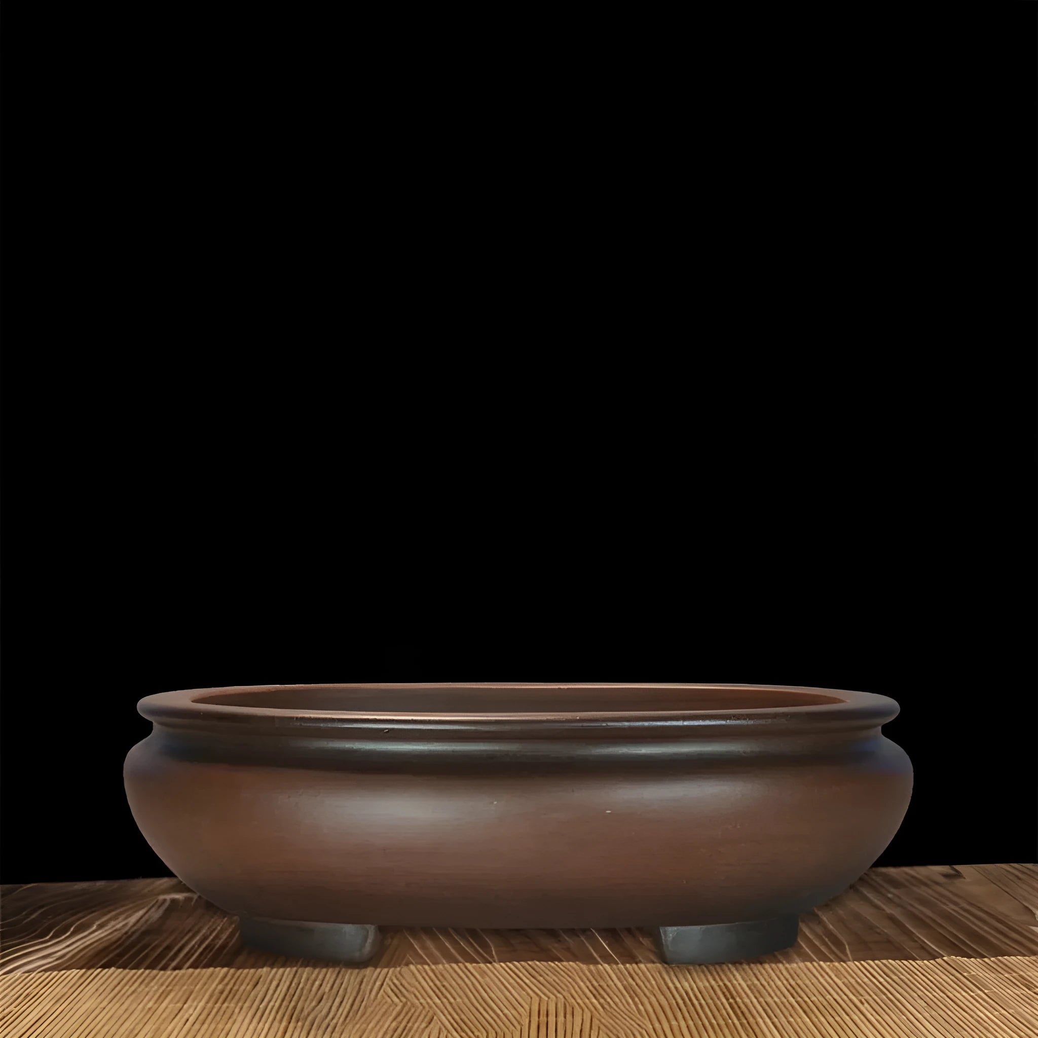 Handmade purple clay classical style flowerpot for indoor desktop use.