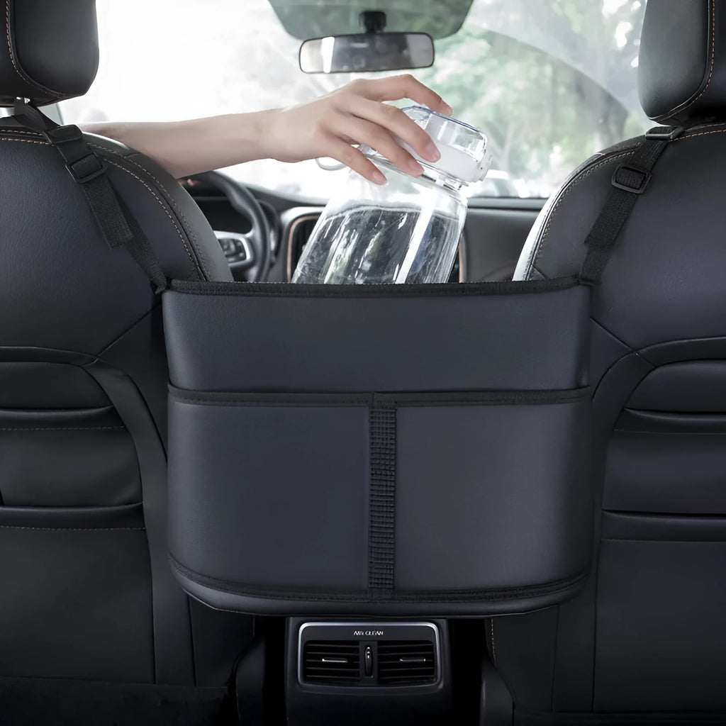 Black leather car seat storage bag with sports carbon fibre pattern measuring 38x24x15cm