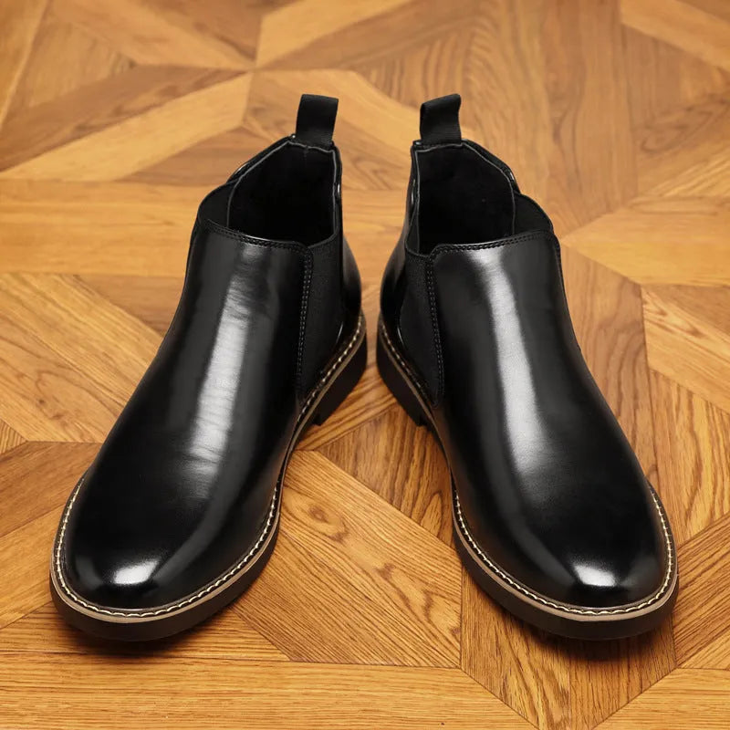 Men's black formal leather boots with pointed toe design and lace-up ankle