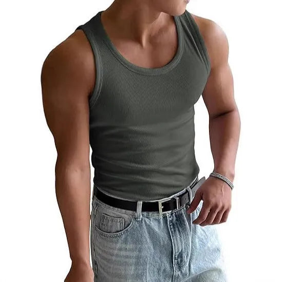Men's round neck grey fitness T-shirt with a wool lining, shown in a tight, sporty fit.