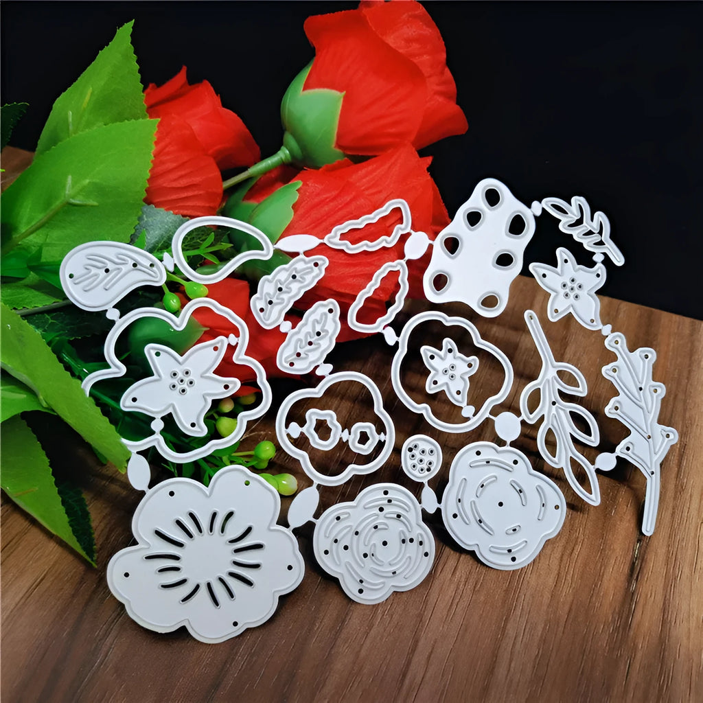 Silver carbon steel flower cutting die with plant design measuring 14.3 by 9.9 centimetres