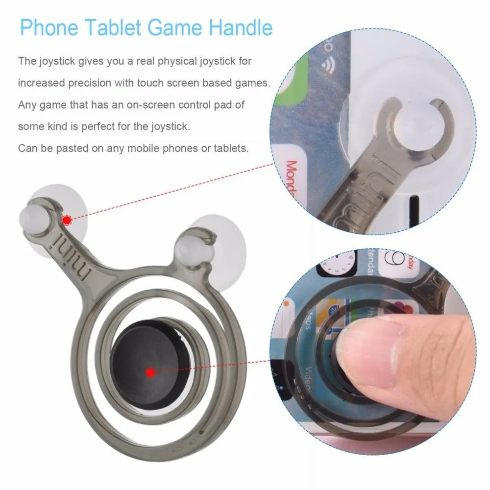 A pair of clear mini joysticks with black caps next to a drawstring bag, for mobile phone touch screen games.