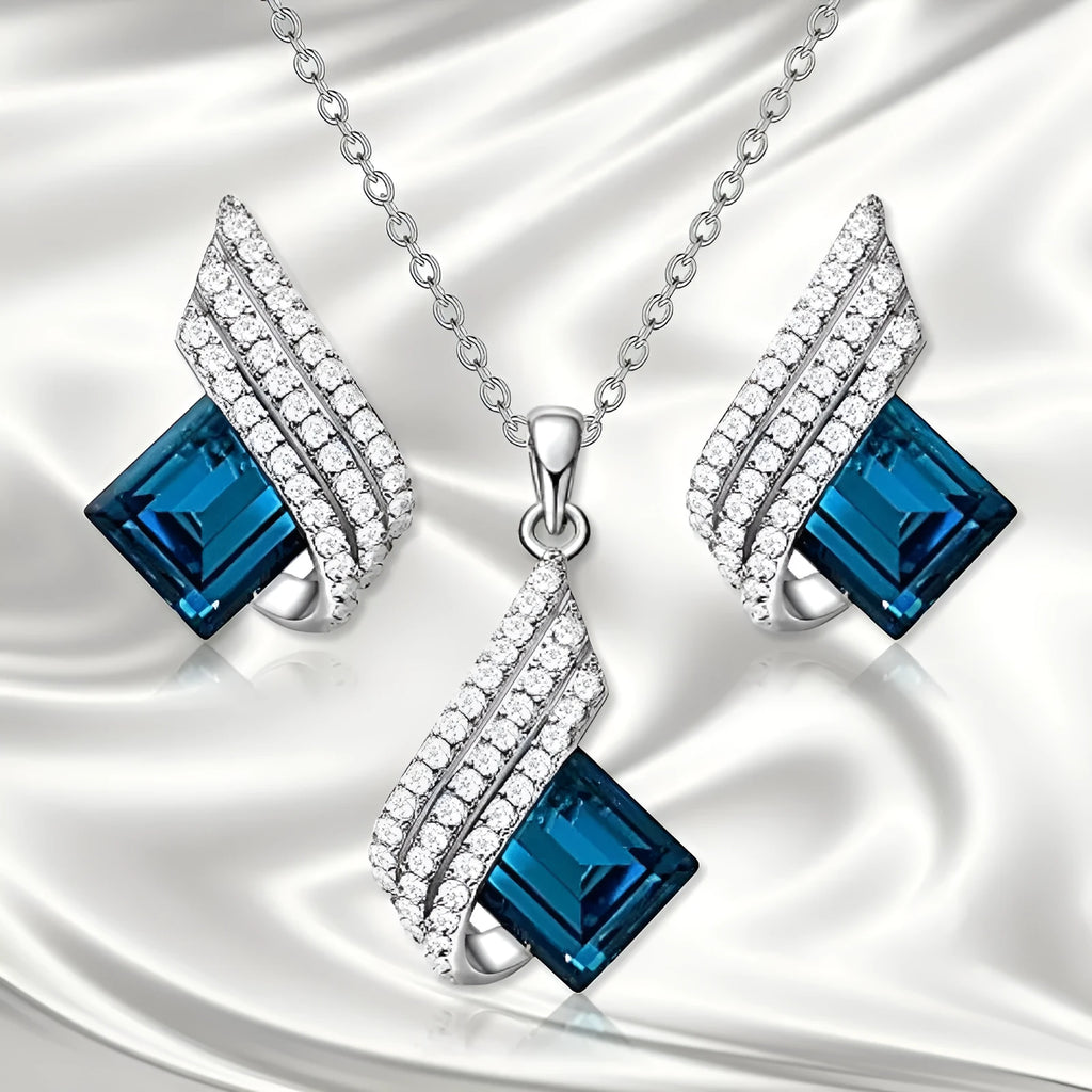 Women's alloy and glass cross chain necklace with matching electroplated stud earrings jewellery set