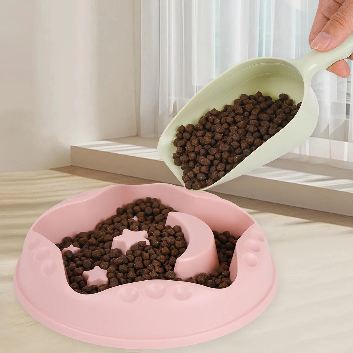 Blue Moon Star Wings slow feeder dog bowl showing raised centre with cut-outs and wide outer food channel.
