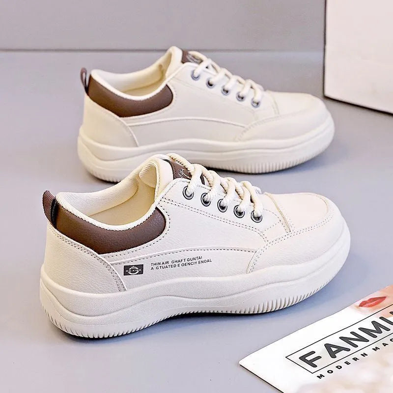 Women's white Korean-style lace-up pumps with cross strap detail and flat 3-5cm heel