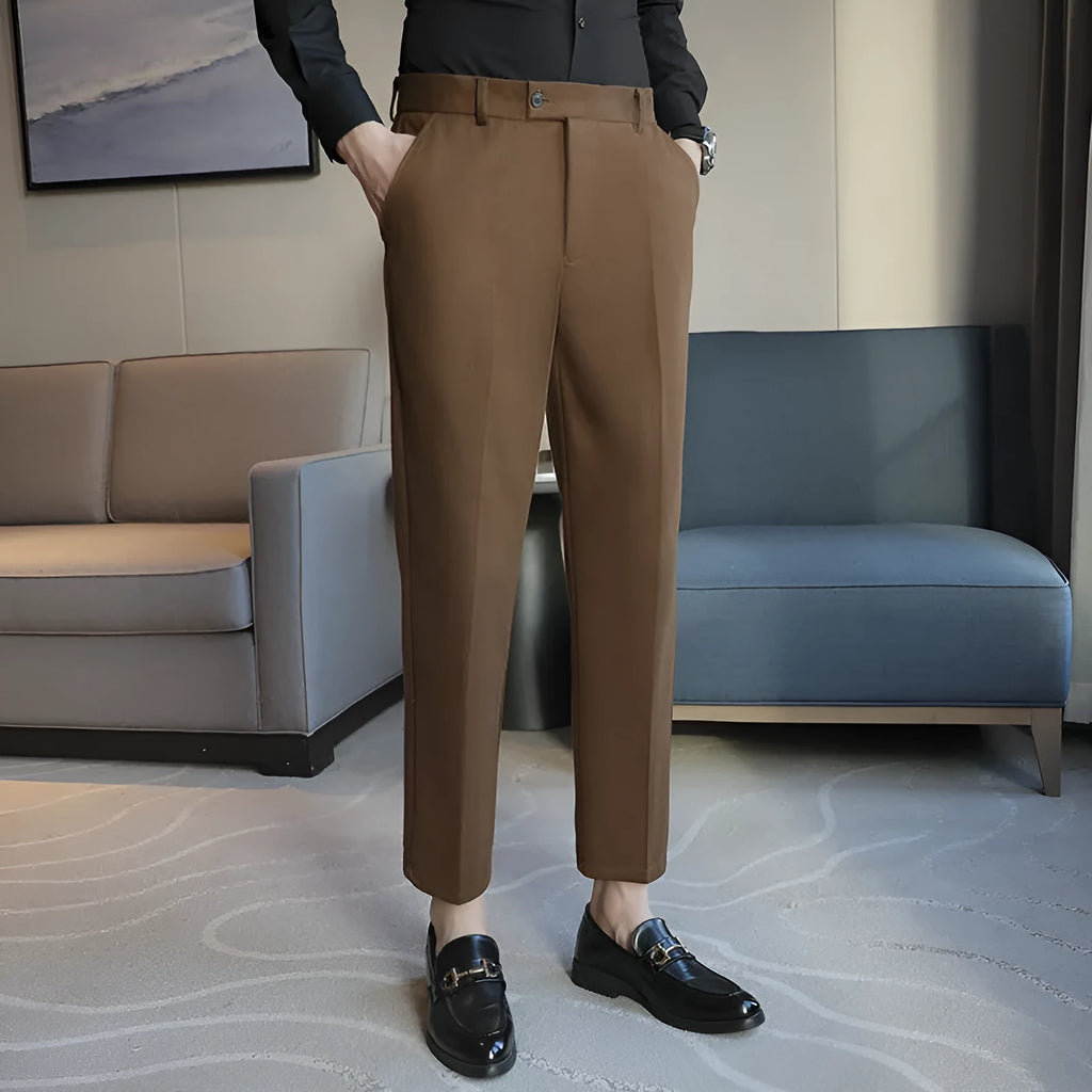 Straight fit brown corduroy trousers with elastic waistband on hanger