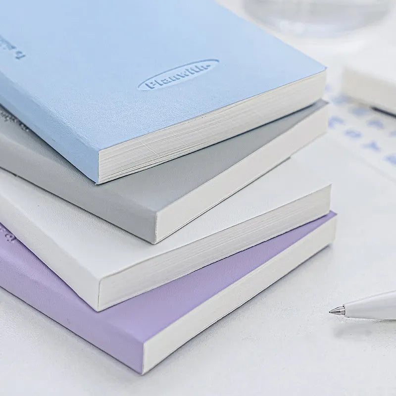 Embossed A5 daily meter notebook in blue, showing its 80 pages of 100g paper.