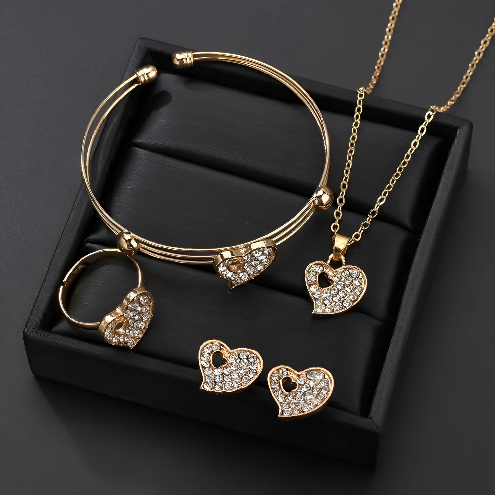 Women's gold-colour alloy jewellery set with heart, water drop and bell pendants including earrings and adjustable decorations