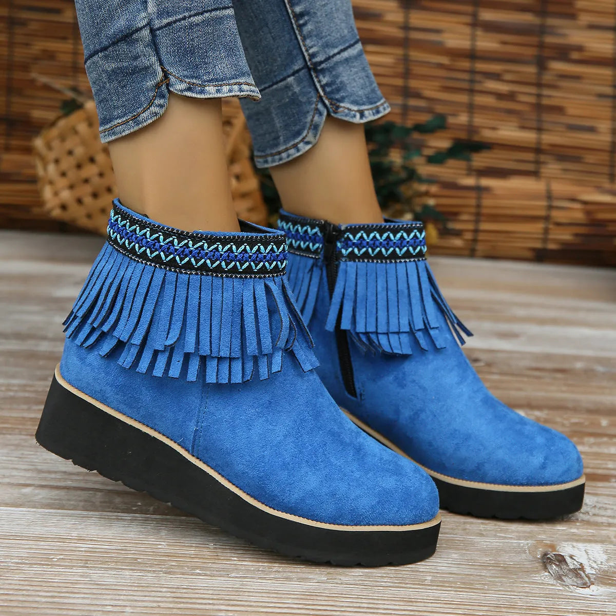 Women's suede wedge ankle booties with side zipper and thick rubber sole in black colour